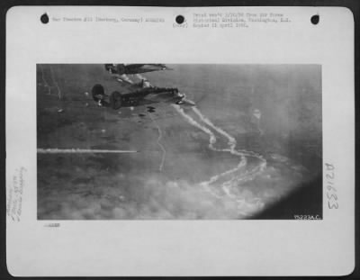 Thumbnail for Consolidated > Bombs Are Dropped From Consolidated B-24 Liberators Of The 489Th Bomb Group On Enemy Installations At Hamburg And Harburg, Germany During A Raid On 6 Oct. 1944.