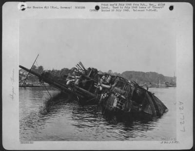 Thumbnail for Consolidated > Ss New York, Famous Hamburg-American Ship Of Trans-Atlantic Run, Lies On Its Side At Kiel, Germany After Allied Bombing.