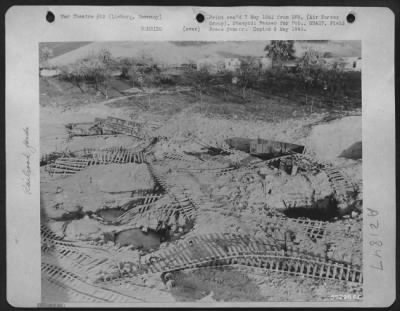 Thumbnail for Consolidated > Bomb Bursts From Martin B-26 Marauders Of Major General Samuel E. Anderson'S 9Th Bomb. Division Ripped Road Beds And Scattered Trackage To Form This Pattern Of Destruction In The Rail Yard At Limburg, Germany.  The Medium Bomber Assault Was One Of The Con