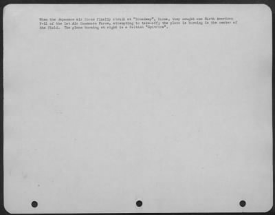 Consolidated > When The Japanese Air Force Finally Struck At 'Broadway', Burma, They Caught One North American P-51 Of The 1St Air Commando Force, Attempting To Take-Off; The Plane Is Burning In The Center Of The Field. The Plane Burning At Right Is A British 'Spitfire.