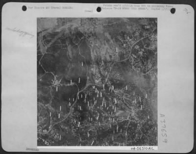 Thumbnail for Consolidated > B-29 Bombs Over Burma (No.2) - Like Flakes Of Snow, Scores Of Bombs From B-29 Superfortresses Of Brig. Gen. Roger M. Ramey'S 20Th Bomber Command Drop Through The Sky To Hit A Japanese Supply Depot Near The Mingaladon Air Field Near Rangoon.  The Gaint Bom