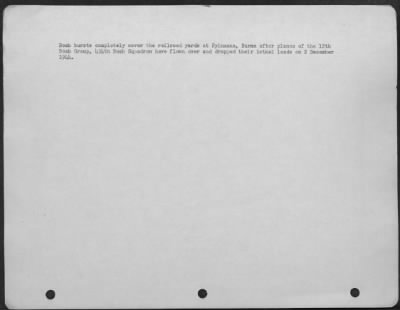 Consolidated > Bomb Bursts Completely Cover The Railroad Yards At Pyinmana, Burma After Planes Of The 12Th Bomb Group, 434Th Bomb Squadron Have Flown Over And Dropped Their Lethal Loads On 2 December 1944.