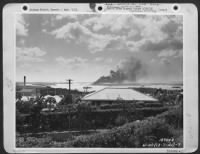 One Of The First Army Photos Of The Bombing Of Hawaii By The Japanese, Dec. 7, 1941.   The Battleship 'Arizona' On Fire And Sinking In Pearl Harbor After The Raid By Japanese Bombers.  Taken From Aexia Heights, T.H. - Page 1