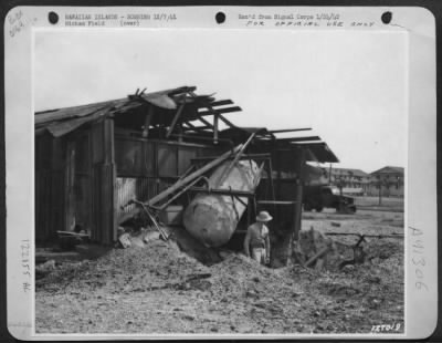 Thumbnail for Consolidated > First Army Photos Of The Bombing Of Hawaii, Dec. 7, 1941.   Latrine On Coronet Avenue, 11:30 Am.  Bomb Damage At Army Airfield.