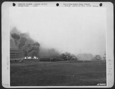 Thumbnail for Consolidated > First Army Photos Of The Bombing Of Hickam Field, Hawaii, Dec. 7, 1941.  Oil Fire Burning.