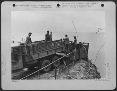 Thumbnail for Consolidated > Truck Is Backed Up To Garbage Rack And Then Rubbish Is Dumped Into The Sea, Saipan, Marianas Islands.