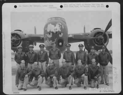 Groups > Personnel Of A Chinese And American Overseas Training Unit Bomber Command Lined Up In Front Of A North American B-25 At Karachi, India.