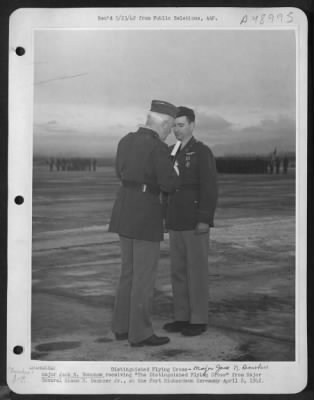 Thumbnail for Groups > Distinguished Flying Cross - Major Jack N. Donohew [:] Major Jack N. Donohew Receiving 'The Distinguished Flying Cross' From Major General Simon B. Buckner Jr., At The Fort Richardson Ceremony April 8, 1942.