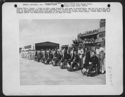 Thumbnail for Groups > Hickam Field, Hawaii - Lined Up Here, Some Standing, And Some In Wheelchairs, Are The 141 Men Who Took Part In The Largest Mass Decoration Ceremony Ever Conducted By The U.S. Army. They Are Men Assigned To Duty At Hawaii'S Hickam Field, And Many Of Them R