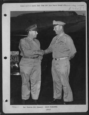 Thumbnail for Groups > Hawaii. General George C. Kenney, Left, Commanding General Of The Pacific Air Command, United States Army, Is Shown Being Welcomed To Hickam Field By Brigadier General E. B. Lyon, Then Commanding General Of The Aaf In The Middle Pacific But Since Reassign