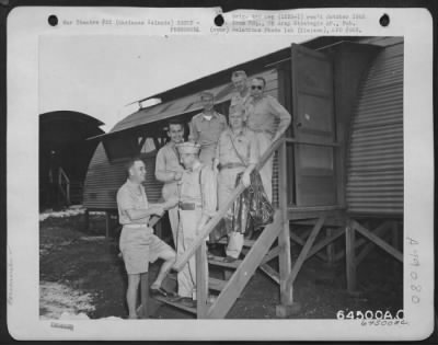 Groups > Five Key Men Of The Aircraft Industry On An Inspection Tour In The Pacific Say Good-Bye To Major General Robert W. Douglass, Jr., Commanding General Of The 7Th Air Force. Rear Row, Left To Right: General Douglas; Donald Douglas, Jr., Director Of Experimen