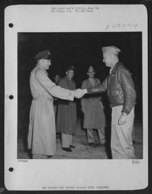 Thumbnail for Groups > Brig. Gen. Haward K. Ramey, Left, Commanding General Of The Vii Bomber Command, Congratulates Colonel Wm. A. Matheny After Successful Completion Of A Trip. [Midway Island]