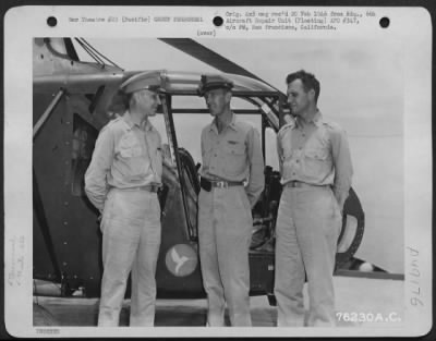 Groups > Brig. General James F. Phillips (Left) Chats With Two Officers Of The 6Th Aircraft Repair Unit (Floating) Beside A Helicopter Aboard Ship Somewhere In The Pacific, 28 August 1945. [Sikorsky R-4]