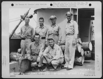 Thumbnail for Groups > Major General Clements Mcmullen (Second From Left, Back Row) Poses With Officers Of The 6Th Aircraft Repair Unit (Floating) Aboard Ship Somewhere In The Pacific.