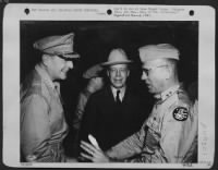 Smiles From The Southwest Pacific. A Jovial Mood Of General Macarthur, Left, Greeting Major General Ennis C. Whitehead, Deputy Commander, U.S. Army Fifth Air Force, Right Was Cought By An Alert Photographer During The Visit Of Under Secretary Of War Rober - Page 1