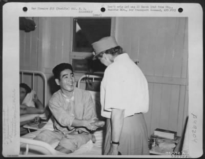 Thumbnail for Groups > During Her Tour Of The Pacific Bases Mrs. F. D. Roosevelt Visits K. Komota, A Wounded Japanese American Soldier At Fiji Islands, 1943.