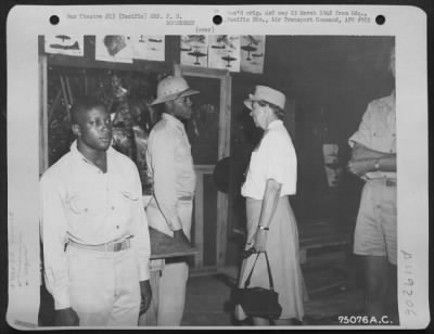 Groups > During Her Tour Of The Pacific Area Mrs. F. D. Roosevelt Chats With Spencer Wilson At Penrhyn Island, Line Group, 1943.