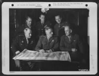 Thumbnail for General Spaatz Confers With Other Generals Of His Command At An Air Base In England.  They Are, Left To Right: Major General Ralph Royce, Lt. General Carl Spaatz, Major General Hugh J. Knerr.  Standing, Left To Right: Brig. Gen. Edward P. Curtis, Major Ge - Page 3