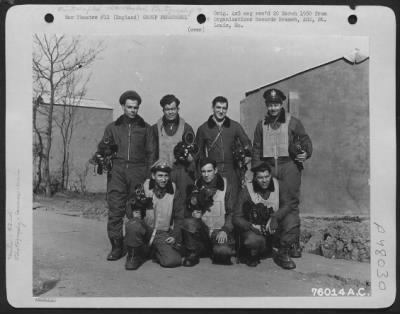 Thumbnail for Groups > Aerial Cameraman Of The 92Nd Bomb Group Pose With Their Cameras At An Airbase Somewhere In England.  14 March 1945.