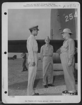 Groups > Having A Discussion At An Air Base Somewhere In North Africa, Are, Left To Right:  Lt. Colonel Davis, Jr., [Co Of The 99Th Fs], Lt. General Carl A. Spaatz And Secretary Of War Stimson.  [Photo Taken On 26 July 1943 At Tunis, North Africa]