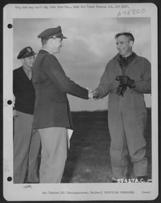 Individuals > Colonel Claude E. Putnam Of Jacksboro, Texas, Co Of The 91St Bomb Group, Receives Congratulations Upon Completion Of A Tour Of Duty In The European Theatre Of Operations On 28 April 1944. Bassingbourne, England.