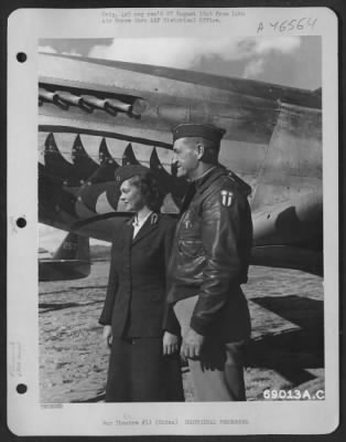 Thumbnail for Individuals > Major General Claire L. Chennault And An American Red Cross Girl Chat Together In Front Of A North American P-51 "Mustang" At A 14Th Air Force Base Somewhere In China. 22 December 1944.