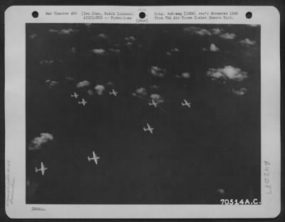 Thumbnail for Consolidated > Consolidated B-24 "Liberators" Roar Over A Wide Expanse Of Water As They Head Toward Iwo Jima, Bonin Islands, For Another Strike On Jap Installations On The Tiny Island, Halfway Between Saipan And The Japanese Homeland.  21 October 1944.