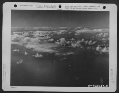 Thumbnail for Consolidated > Consolidated B-24 "Liberators" Roar Over A Wide Expanse Of Water As They Head Toward Iwo Jima, Bonin Islands, For Another Strike On Jap Installations On The Tiny Island, Halfway Between Saipan And The Japanese Homeland.  21 October 1944.