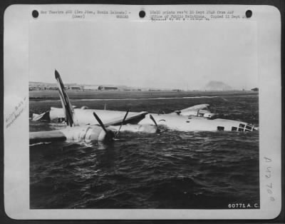 ␀ > This Boeing B-29 "Superfortress" Found Iwo Jima Fog-Closed.  The Plane Was Forced To Ditch Off The Shore; But The Crew Swam To Safety.  Bonin Islands.