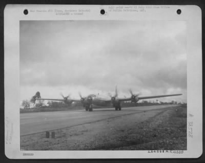 Consolidated > The Famous Boeing B-29 'The Challenger' Taxies Down The Strip At Harmon Filed, Guam, Marianas Islands.  The Plane, Carrying A Payload Of Approximately 34,000 Pounds, Broke The World'S Altitude Record When It Winged Its Way To A Height Of 37,400 Feet.  Jun