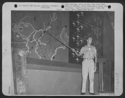 Thumbnail for Consolidated > Staff Members Explaining An Impending Mission To Crews Of The 500Th Bomb Group.  13 August 1945.