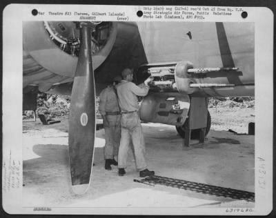 Thumbnail for ␀ > Armorers Check .50 Cal Machine Guns Mounted On A North American B-25 Prior To A Mission. Tarawa, Gilbert Islands, 6 January 1944. 820Th Bomb Squadron, 41St Bomb Group.