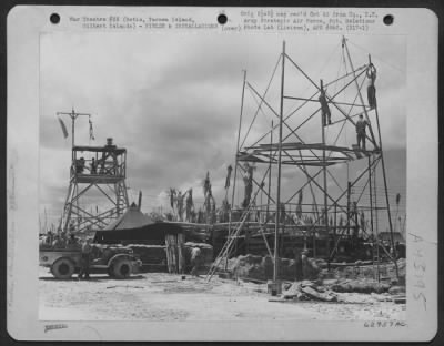 Thumbnail for Construction, Buildings > Control Tower Under Construction On Betio, Tarawa Island, In The Gilbert Island Group.  The Old Control Tower Is In The Background.  19 January 1944.