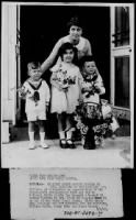 Children presenting Mrs. Coolidge with flowers - Page 1