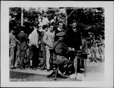 Thumbnail for 1925 > John Coolidge entering C.M.T.C. Camp Devens, Mass.