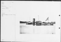 Thumbnail for B-40 Deck of Monitor on James River, VA. Monitor in James River. Double-turret monitor Onodaga, port quarter view in stream; boats crew alongside in tender, with oars tossed.