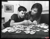 Thumbnail for 1966-mary-tyler-moore-son-richie-stamp-collecting-vintage-original-photo-gp.jpg