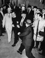 Thumbnail for Lee_Harvey_Oswald_being_shot_by_Jack_Ruby_as_Oswald_is_being_moved_by_police,_1963.jpg