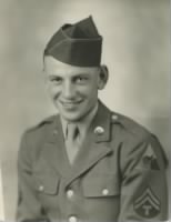 Thumbnail for JamesRayfordLandmon_USArmyServicePhoto1943_TankDriver.jpg