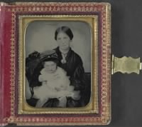 lossy-page1-1024px-Unidentified_woman,_possibly_Mrs._James_Shields,_in_mourning_dress_and_brooch_showing_Confederate_soldier_and_holding_young_boy_wearing_kepi_LCCN2013649140.tif.jpg