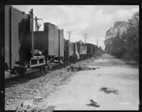 Thumbnail for Photograph_of_Railroad_Cars_at_Dachau_Concentration_Camp_-_NARA_-_849160.gif