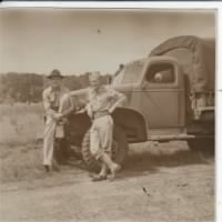 Dr. Chambers at MacDill Field Tampa Fla leaning on a jeep after manuvers July 1941.jpg