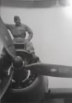 Thumbnail for Dad astride airplane engine.jpg