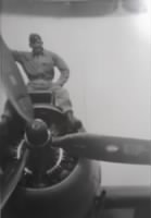 Thumbnail for Dad astride airplane engine.jpg