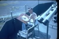 Jim Cleland on open bridge of ship Jan 1955.JPG