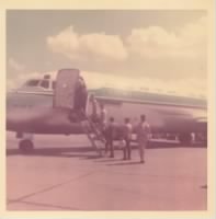 Thumbnail for David Thomson Boarding Plane for Vietnam.jpg