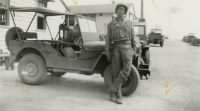 Clarence Weible with jeep (Courtesy of Sandra Weible Beakes).jpg