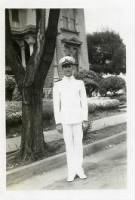 Thumbnail for Grandpa in Navy uniform in front of boarding house in Oakland from David Schmid on Ancestry