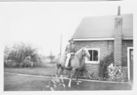 Bud on horse, Bluebell, 1955.jpg