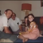 Grandpa playing a game with my Dad and sister.